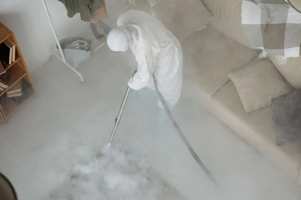 Biohazard cleanup technician in protective equipment, Warrington, FL
